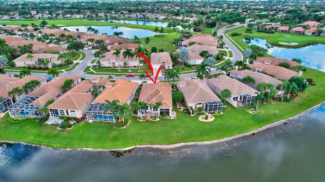 drone / aerial view with a water view