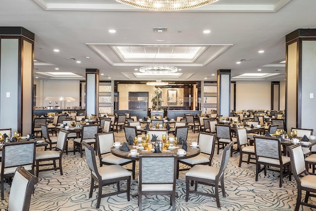 dining area featuring a tray ceiling