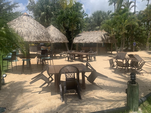 view of patio / terrace featuring a gazebo and an outdoor bar