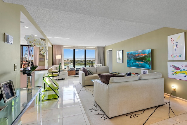 tiled living room with a textured ceiling