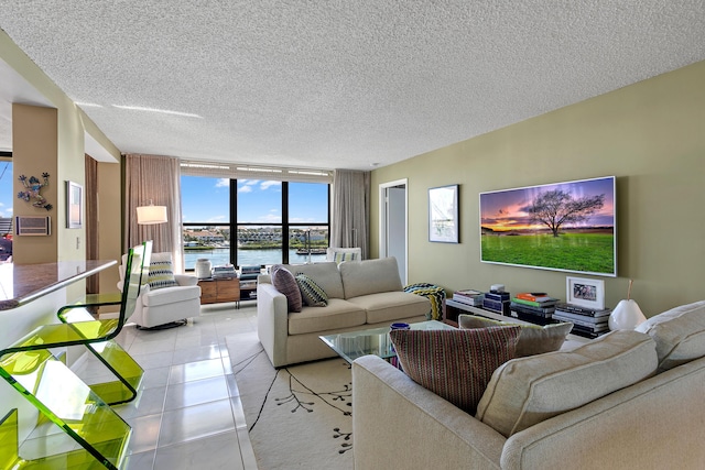 living room with light tile patterned floors and a textured ceiling