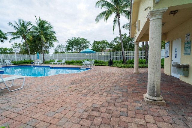 view of swimming pool featuring a patio