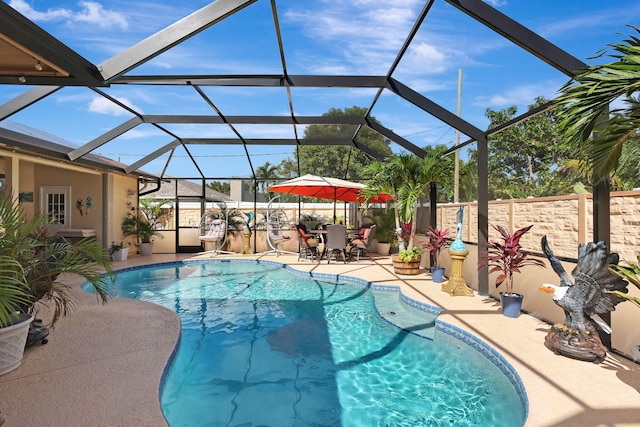 view of pool featuring a patio area and a lanai