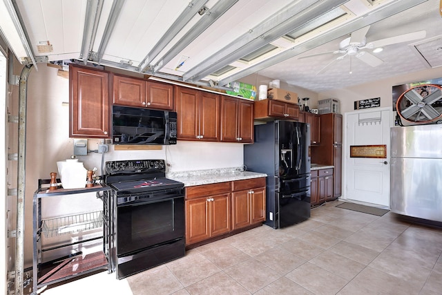 kitchen with black appliances, ceiling fan, and light tile patterned flooring