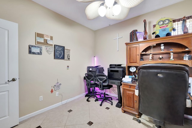 tiled home office featuring ceiling fan