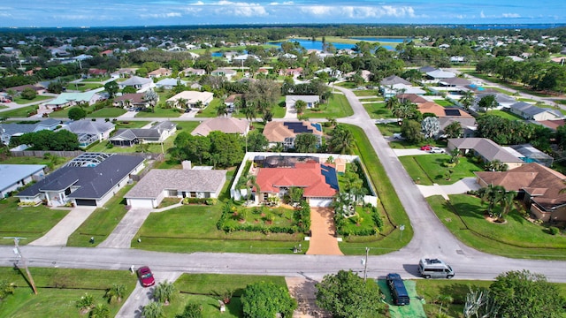 drone / aerial view with a water view