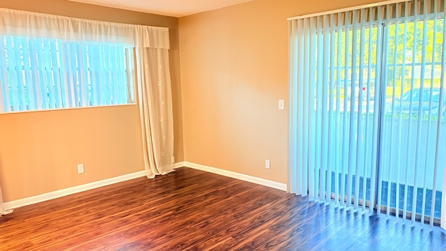 empty room featuring hardwood / wood-style floors