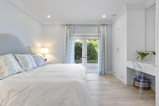 bedroom featuring access to exterior, french doors, light hardwood / wood-style floors, and crown molding