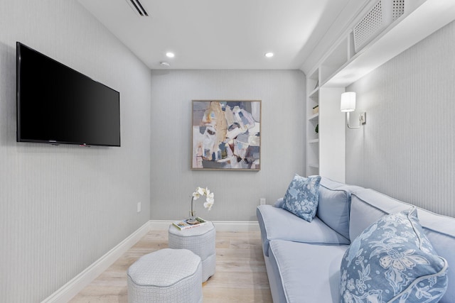 living room with light hardwood / wood-style floors