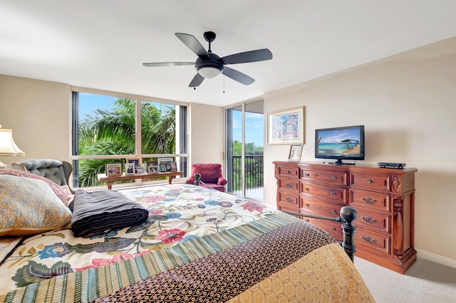 bedroom with access to exterior, ceiling fan, and light carpet