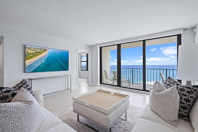 living room featuring a water view