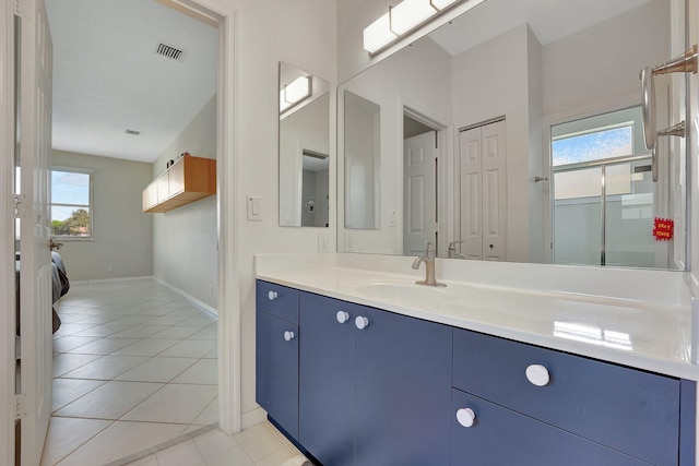 bathroom featuring vanity and tile patterned flooring