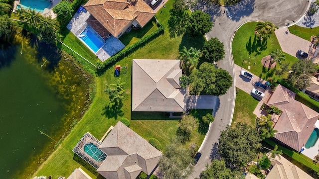 drone / aerial view with a water view