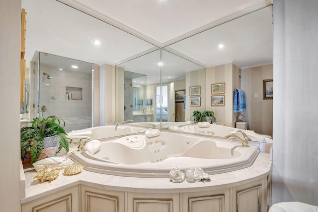 bathroom featuring separate shower and tub and toilet