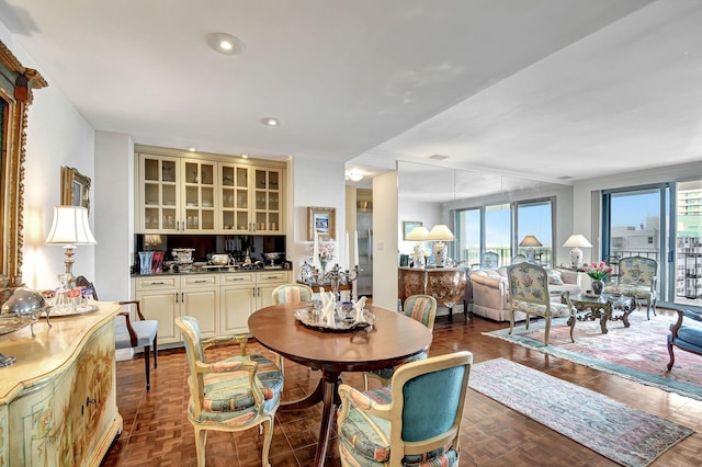 dining room with parquet flooring