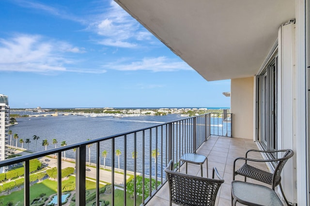 balcony featuring a water view