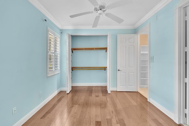 unfurnished bedroom with light wood-type flooring, ceiling fan, and crown molding