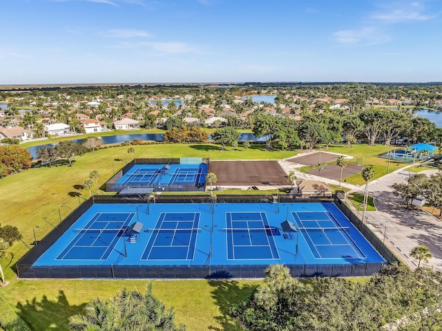 drone / aerial view with a water view