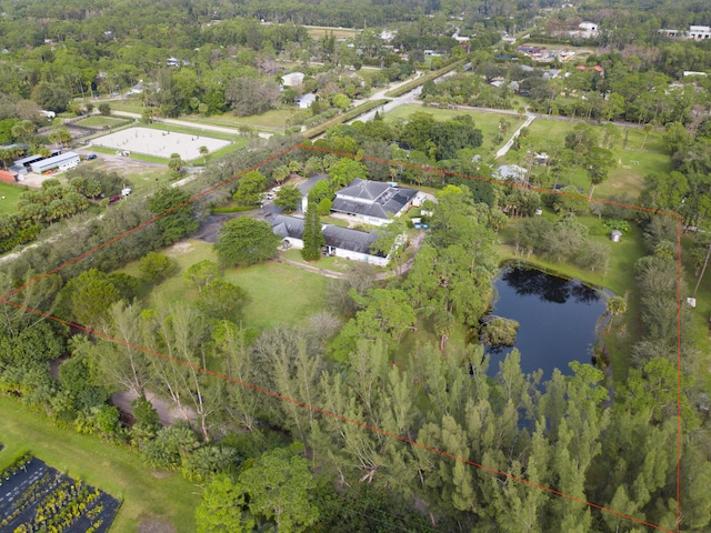 bird's eye view with a water view