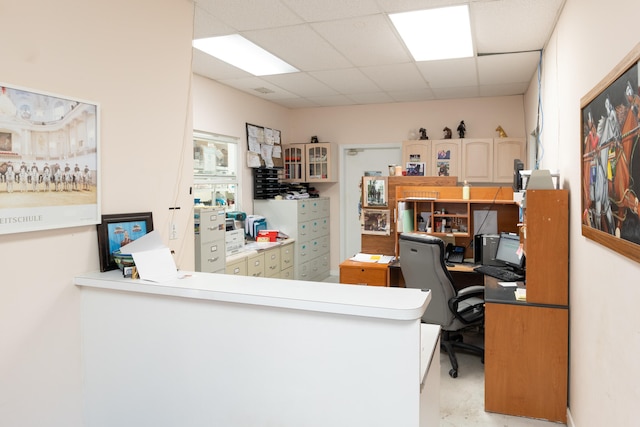 office featuring a drop ceiling