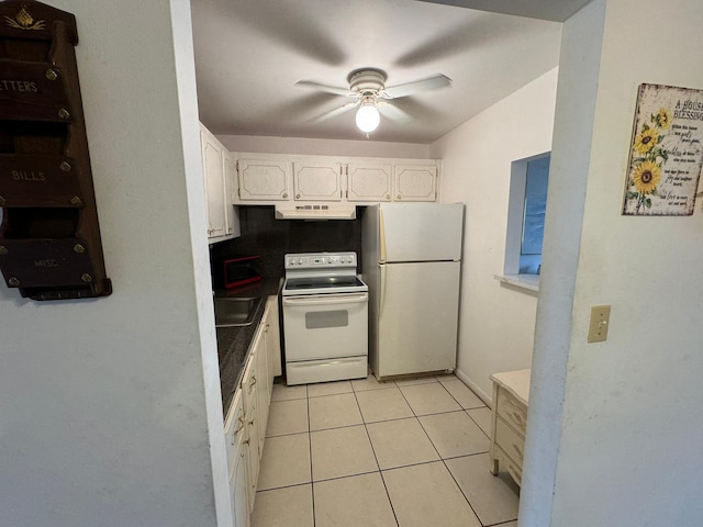 kitchen with white cabinetry, light tile patterned floors, sink, white appliances, and ceiling fan