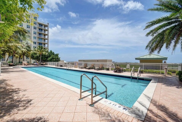 view of pool featuring a patio area