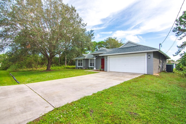 ranch-style home featuring central air condition unit, a garage, and a front yard