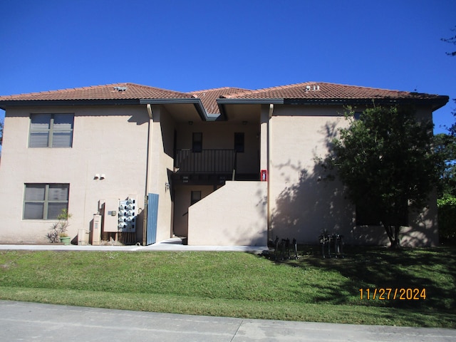 view of side of property featuring central AC