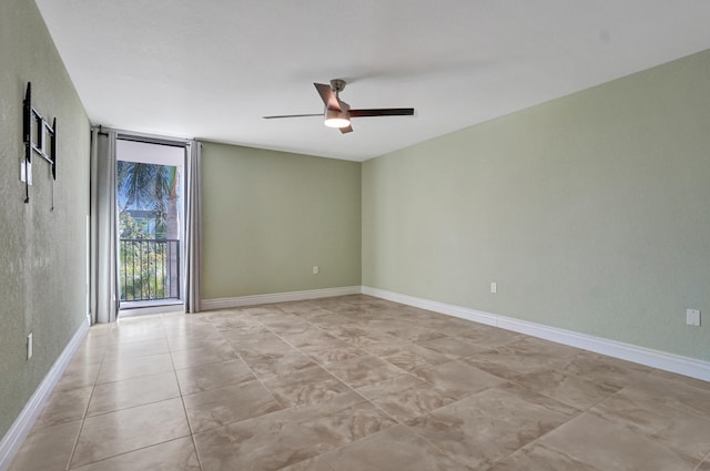 spare room featuring ceiling fan