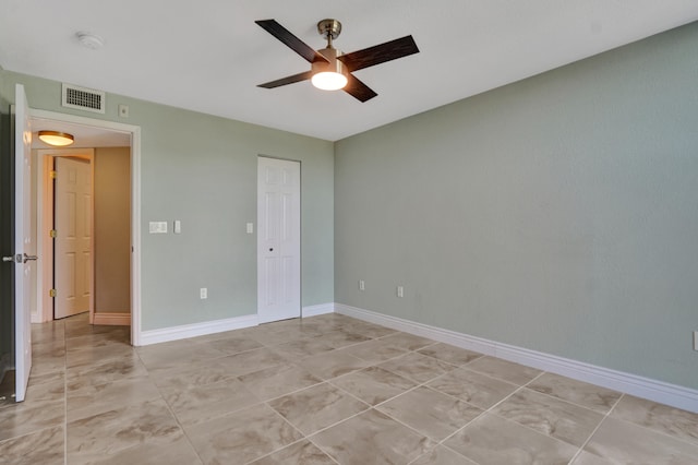 unfurnished bedroom with a closet and ceiling fan