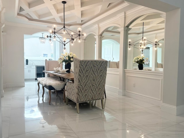 dining area featuring ornamental molding, a healthy amount of sunlight, and coffered ceiling