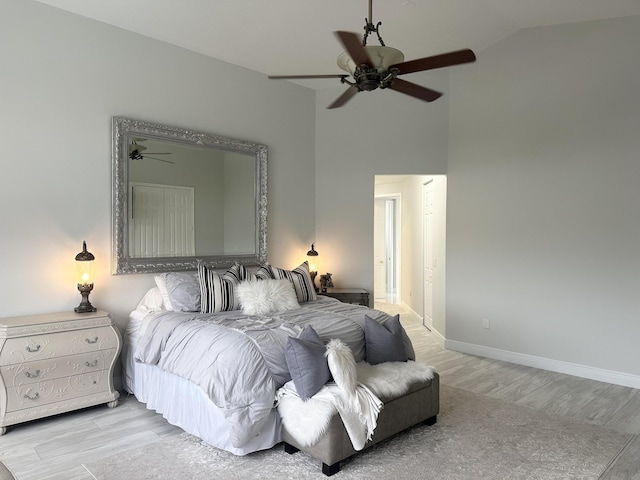 2727 Eleanor Way, Wellington, FL 33414 - bedroom featuring wood finished floors, high vaulted ceiling, baseboards, and ceiling fan