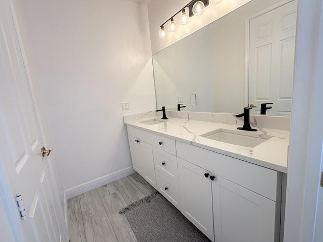 2727 Eleanor Way, Wellington, FL 33414 - full bath with double vanity, baseboards, and wood finished floors
