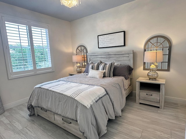 bedroom with light wood-type flooring