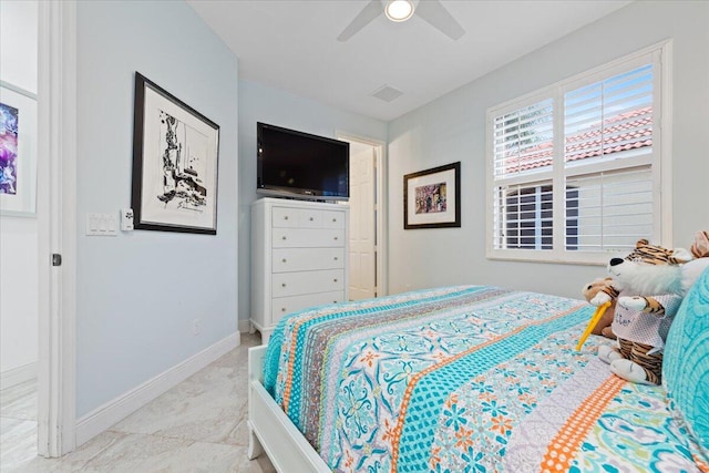 bedroom featuring ceiling fan