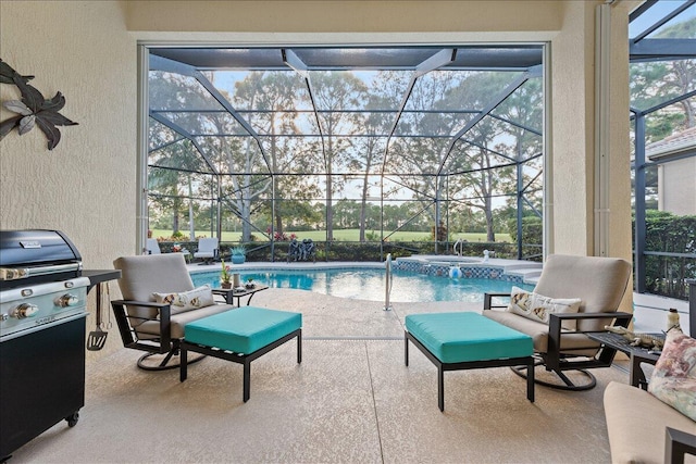 exterior space featuring area for grilling, glass enclosure, and a pool with hot tub