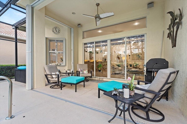 view of patio with ceiling fan