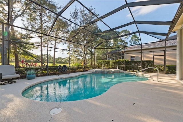 view of swimming pool featuring glass enclosure and a patio