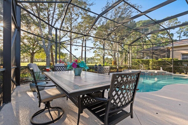 view of swimming pool featuring a lanai and a patio area