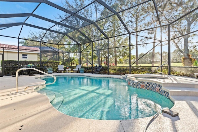 view of swimming pool with a lanai, an in ground hot tub, and a patio