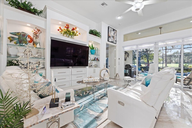 living room with ceiling fan