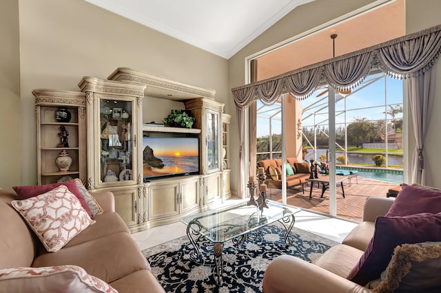 living room with ornamental molding, light hardwood / wood-style floors, and lofted ceiling