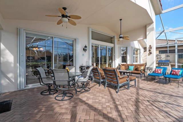 view of patio featuring an outdoor living space, ceiling fan, and a lanai