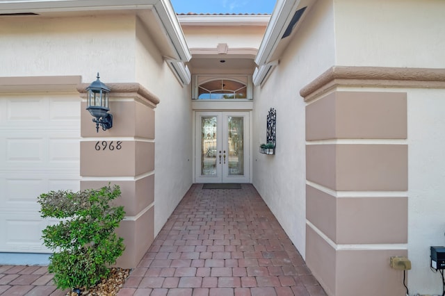 doorway to property with french doors