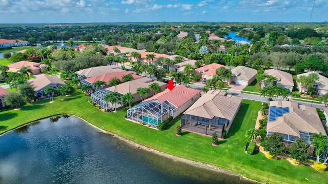 drone / aerial view with a water view