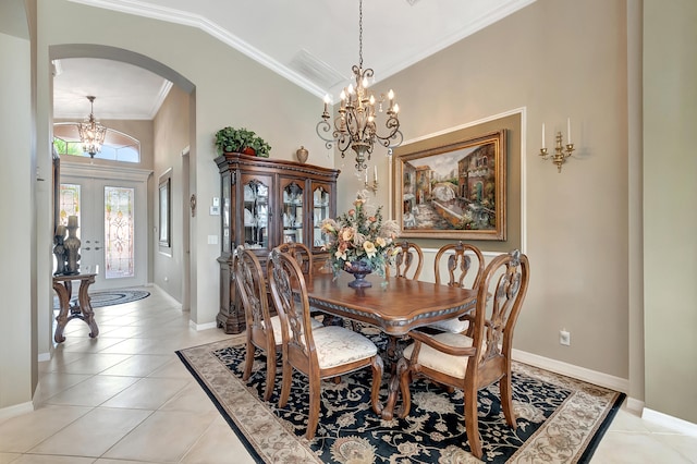 tiled dining room featuring french doors, lofted ceiling, crown molding, and a notable chandelier