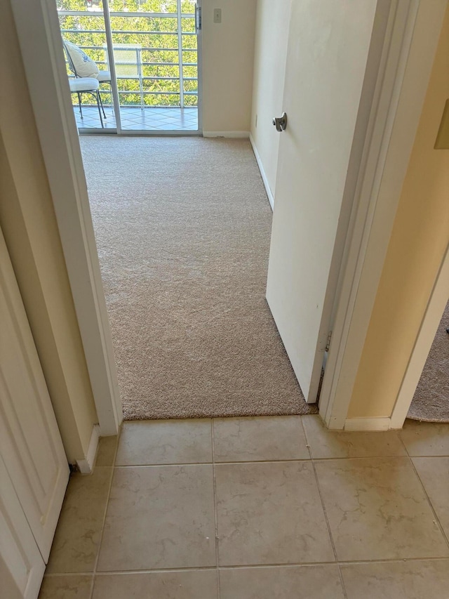 corridor with light carpet