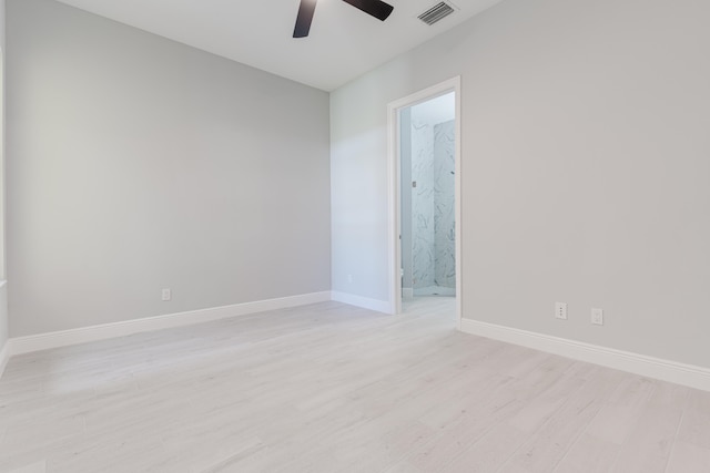 unfurnished room with ceiling fan and light hardwood / wood-style flooring