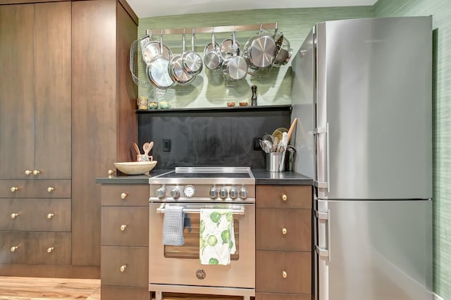 kitchen featuring light hardwood / wood-style floors and stainless steel appliances