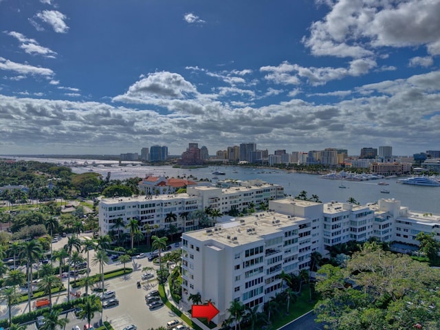 birds eye view of property featuring a water view